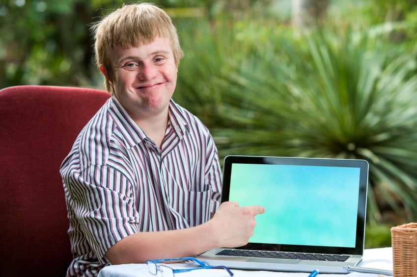 Social Security. Boy pointing at laptop